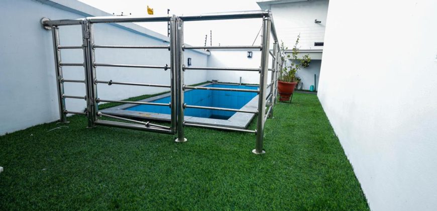 Contemporary 5 bedroom Smart Home with a maid rooms and swimming pool.